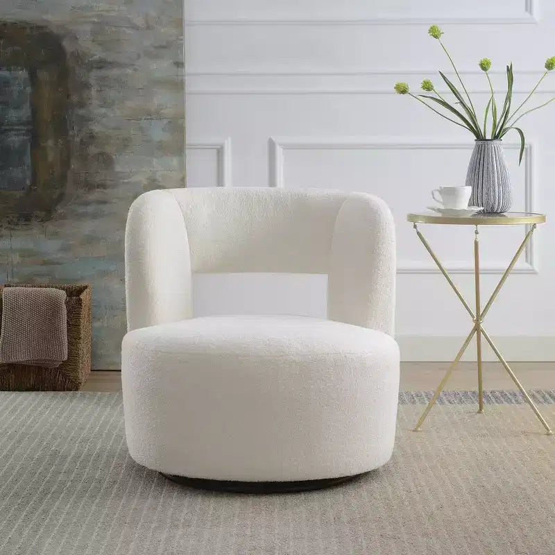 Poltrona girevole a 360° con rivestimento "Teddy" nei colori crema, grigio o rosa, seduta singola