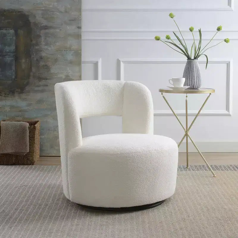 Poltrona girevole a 360° con rivestimento "Teddy" nei colori crema, grigio o rosa, seduta singola
