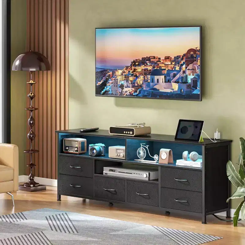 Mobile TV nero con luci a LED e stazione di ricarica, 6 cassetti in tessuto, adatto a TV fino a 60"